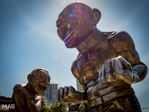 Laughing Sculptures in Vancouver by Yue Minjun